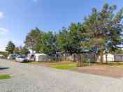 Pine Views filly serviced hardstanding and grass touring pitch