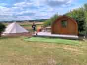 Husband enjoying looking at the cabins and bell tents. (added by visitor 19 Jul 2020)