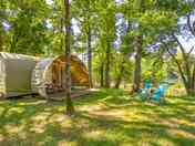 Partially shaded safari tent pitch
