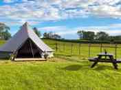 Bell tent and outdoor seating