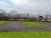 Electric hardstanding and grass touring pitch