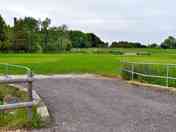 View over bridge of grass pitches