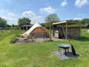 Family Bell Tent with private out door kitchen and fire pit.
