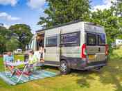Campervan on the all-weather pitch with astroturf