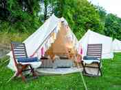 View looking into the tent set up with twin beds