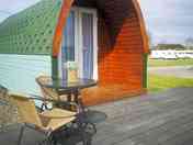 Acorn Pod with decking and bistro set to enjoy the view