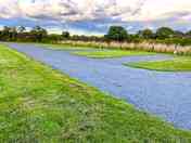 Level hardstanding pitches