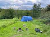 Looking down the slope to the tent pitch on pitch 14