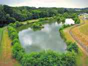Grass pitches by lakes