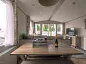 Kitchen and Living Area in standard 3 bedroom static caravan. Prosecco & hamper is not standard