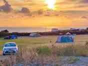 Visitor image of the camping field at sunset (added by manager 11 Oct 2022)