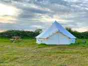 Bell Tent exterior with picnic table