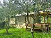 Yurt exterior with a picnic table