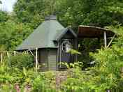 View up to ‘Willow’ Hobbit Hut from one of the ponds
