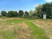 The Gobble Gobble surrounded by natural grass