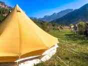 Ocre bell tent with mountain views