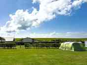 Electric grass tent pitch