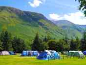 Electric tent pitch with Ben Nevis in the background