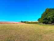 Camping field with coastal view