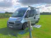 Electric grass pitch with water point