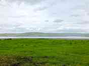Campervan parking area with scenery and private beach access