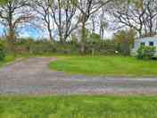Badger's Den pitch, part hardstanding and part grass