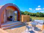 Beautiful secure garden with sofa, BBQ and table & chairs, overlooking the meadow