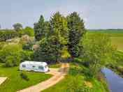 Pitch #1 next to the river. Motorhome only.