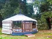 Outdside the white yurt