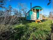 Dragonfly Shepherds Hut - lit by solar lights for a magical evening under the stars. (added by manager 28 Mar 2022)