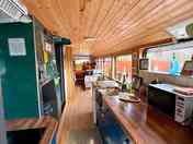 Downstairs kitchen, with view through to dining and lounge area.