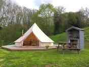 Bell tents all have their own little kitchen huts