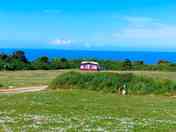 Grassy fields near the coast