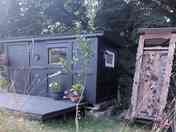 Exterior of Shepherds hut and compost toilet