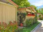Three-bed cabins with pretty landscaping