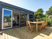 Pod deck with outdoor dining table and chairs