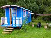 Pink gypsy caravan with outdoor awning