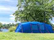 Non-electric tent pitch next to the lake