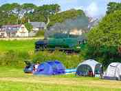 The steam train running past