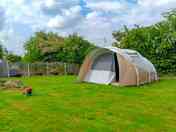 Electric optional grass tent pitches
