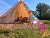 Bunting outside the bell tent