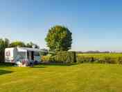 Spacious pitches on a camping farm in Odijk