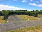 One of the spacious hardstanding pitches with water, waste and electricity