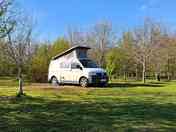 Spacious pitches surrounded by trees