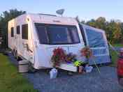 Fully-serviced grass and gravel touring pitch