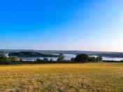 This is a picture of lake view grass pitches at Nesta Valley