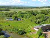 Balebarn Eco-lodge, the fishing pond and the big wildlife pond at Wheatland Farm