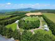 Aerial view of the grassy site (added by manager 08 May 2023)