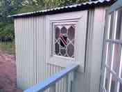 Tinks shepherd's hut by the stream
