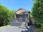 Deluxe cabin with stairs to the decking